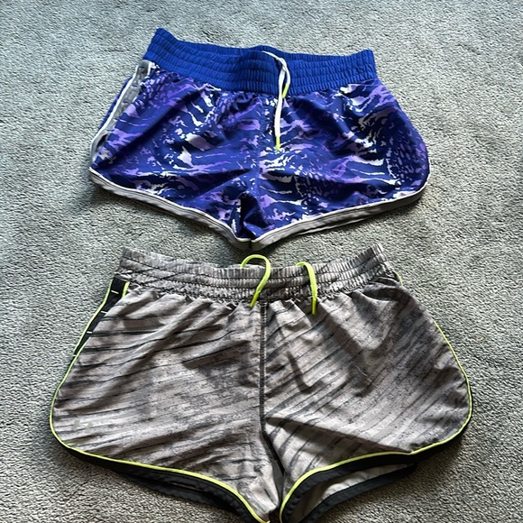 Two pair of Under Armour running shorts. - Picture 1 of 11